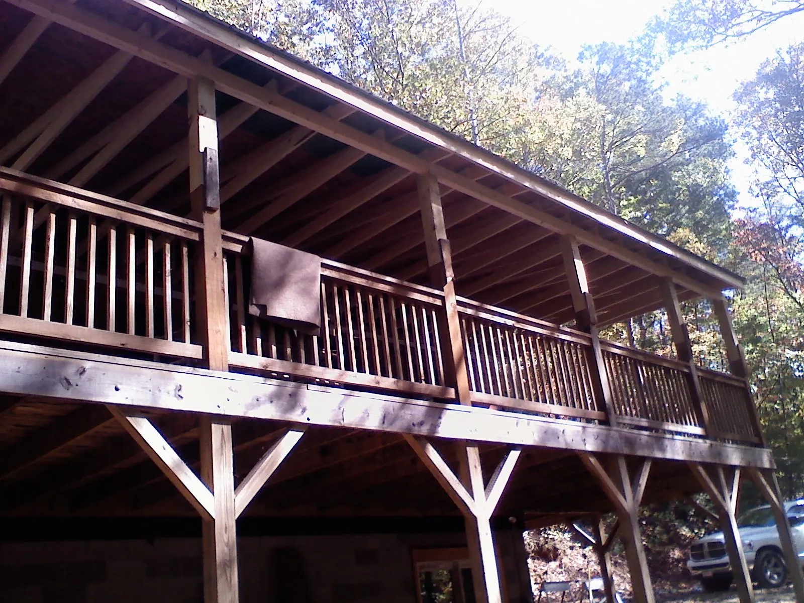 Timber framing under a new elevated porch and deck — Roof Leak Repair in Mize by Roofing Brothers